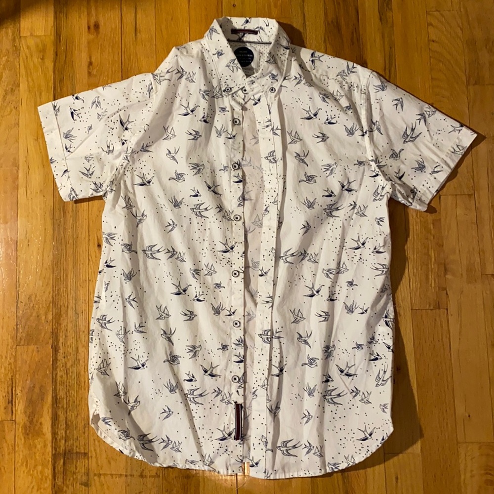 Men’s button down casual dress shirt.